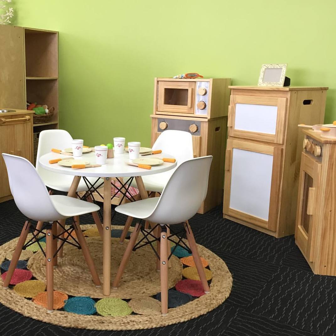 Childcare room with role play toys